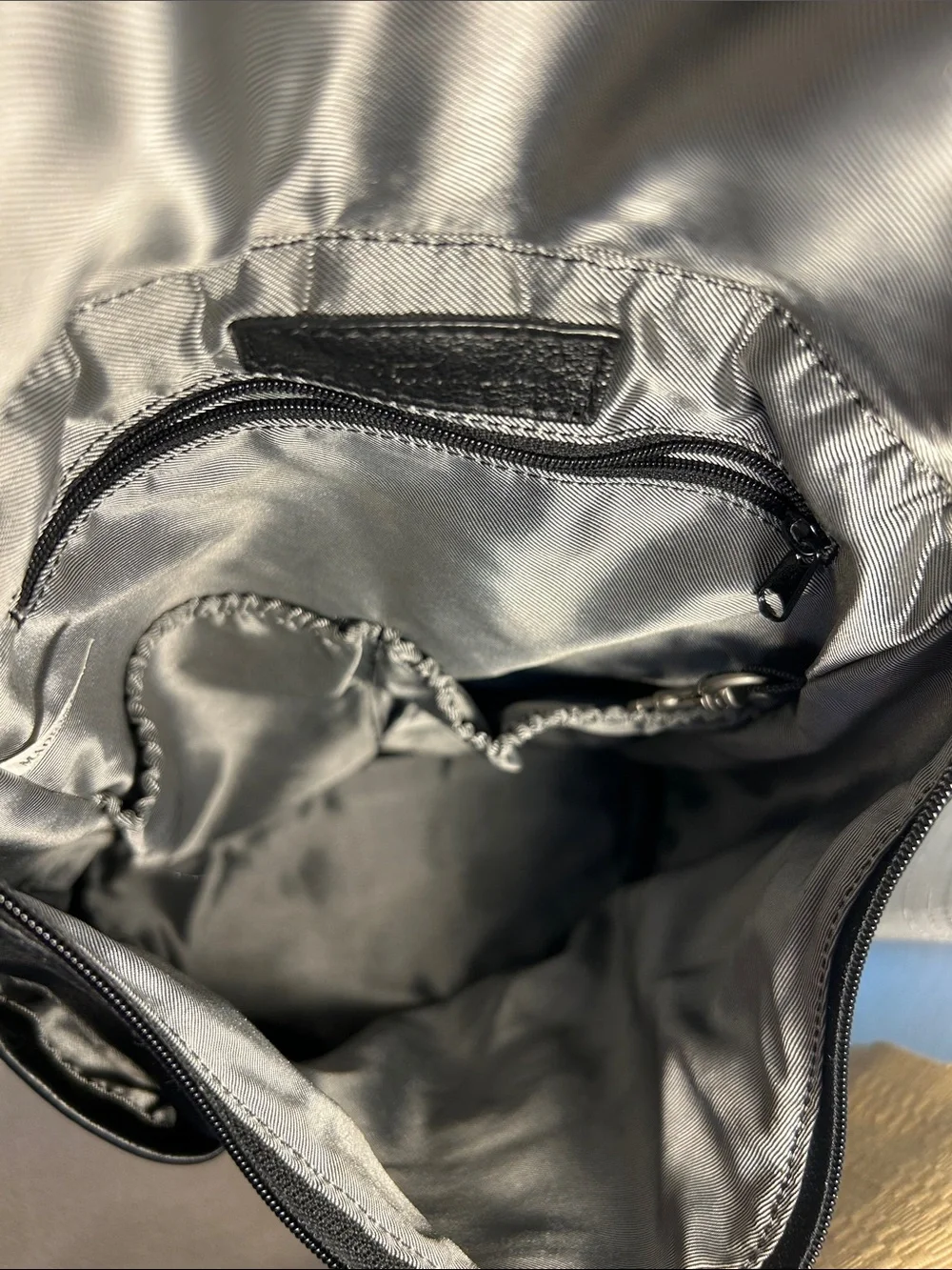Black Leather Norm Thompson Backpack with 3 front Pockets